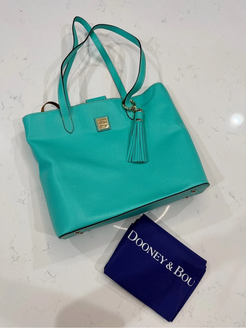 Dooney & Bourke Turquoise Tote with Tassel Charm